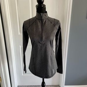 Womens Reebok half zip pull over.